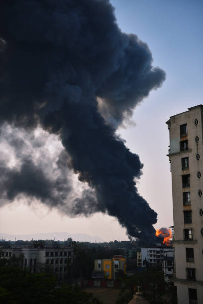 istock Smoke coming out from the fire in factory 1262898959