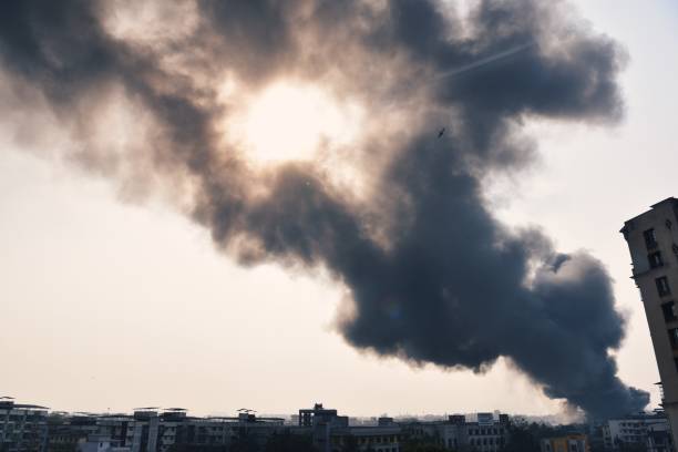 istock Smoke coming out from the fire in factory 1262898961