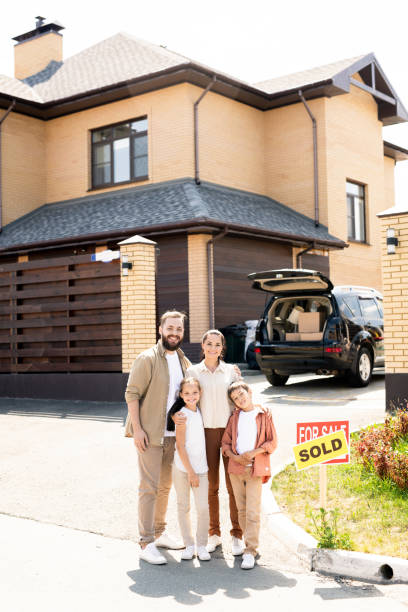 istock Family against cottage house 1262902033