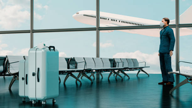 istock Ready for secure take off wearing face mask for protection in airport 1262903844