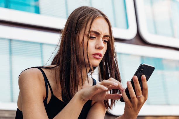 istock Worried Woman Checking Messages on Smart Phone 1262905217