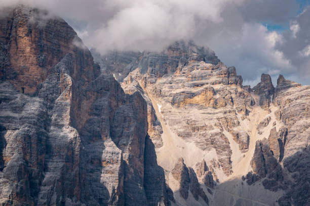 Steep, imposing walls of Tofane in Italian Dolomites. stock photo