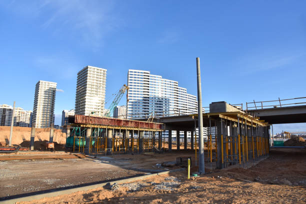 istock Bridge Contractor pouring Concrete at construction site. Crane work on building bridge 1262907501