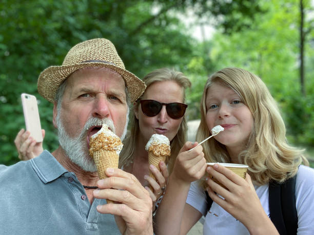 istock Ice cream eating family 1262909267