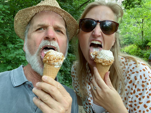 istock Ice cream eating Father and daughter 1262909277