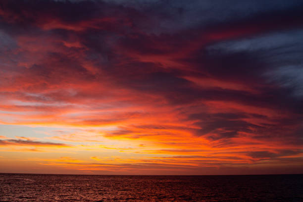 istock Beautiful sunset over the tropical sea 1262910813