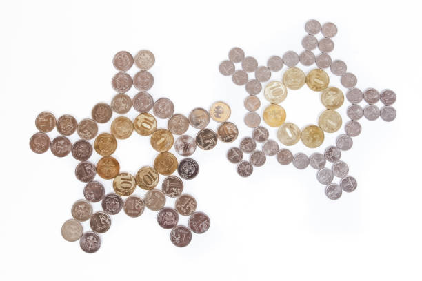 istock Coins laid out in the shape of a clock 1262911190