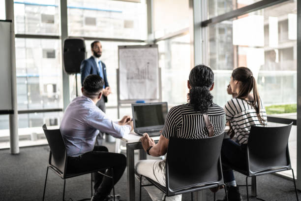 istock Manager doing a business meeting with his colleagues 1262915113