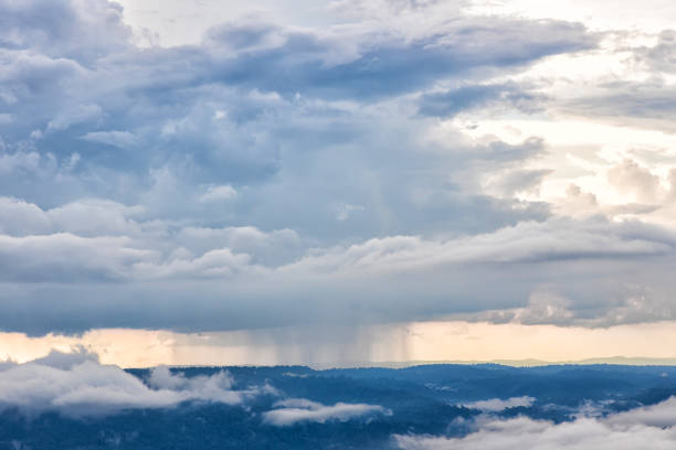 Storm clouds with rain over mountain.  Thunder storm sky Rain clouds.