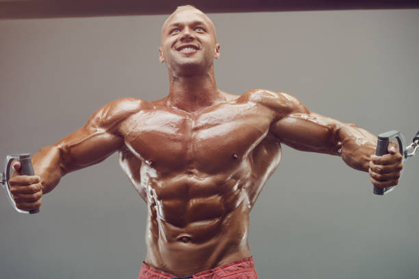 istock cable crossovers fitness man pumping up muscles 1262935240