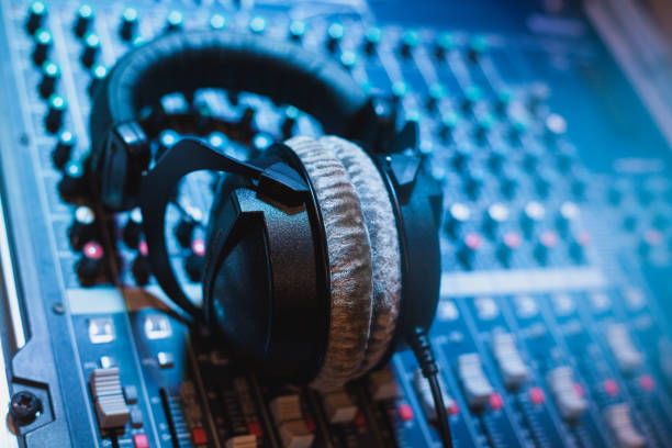 istock Headphones and sound table 1262936386