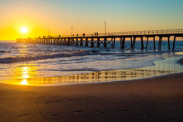 istock Fishermen on Port Noarlunga jetty at sunset 1262947963