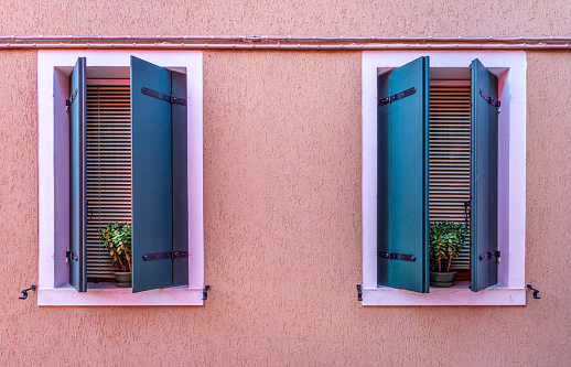 colorful windows in Burano, Italy