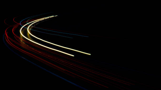 istock lights of cars with night 1262957533