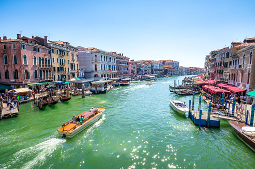 Venice, Italy, August 15, 2017: elevated poing of view of Venice's Grand Canal. Photo taken from the famous Rialto Bridge