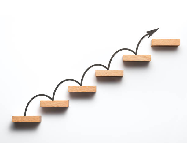 Wooden stairs rising arrow on staircas stairs on white stock pictures, royalty-free photos & images