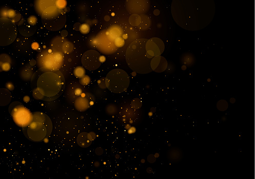 Light bokeh effect.  Glitter and elegant  for Christmas.  Gold, yellow sparkling magical dust particles. Magic concept. Abstract blur on black background. Vector