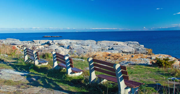 Sea View-Portsmouth NH-Benches overlooking the breakers Sea View-Portsmouth NH-Benches overlooking the breakers new hampshire photos stock pictures, royalty-free photos & images