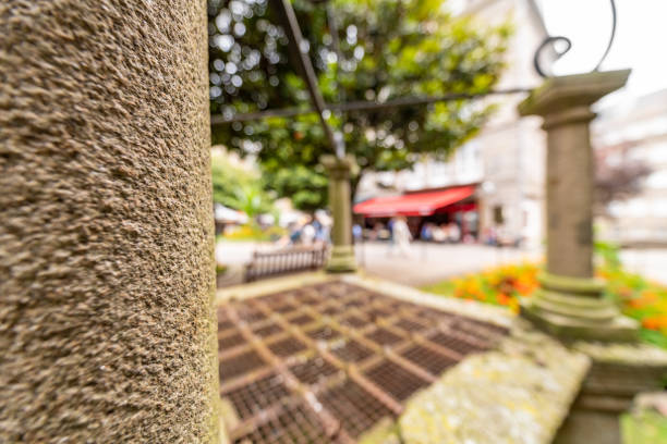 Town well detail in St Malo, France Town well detail in St Malo, France thomas wells stock pictures, royalty-free photos & images