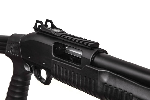 istock Modern pump action tactical shotgun isolate on a white background. Armament of the police, army and special units. Weapons for sports and self-defense. 1262975708