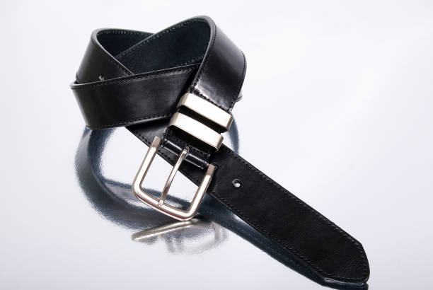 istock Black Leather belt; Photo On Neutral Background. 1262977035