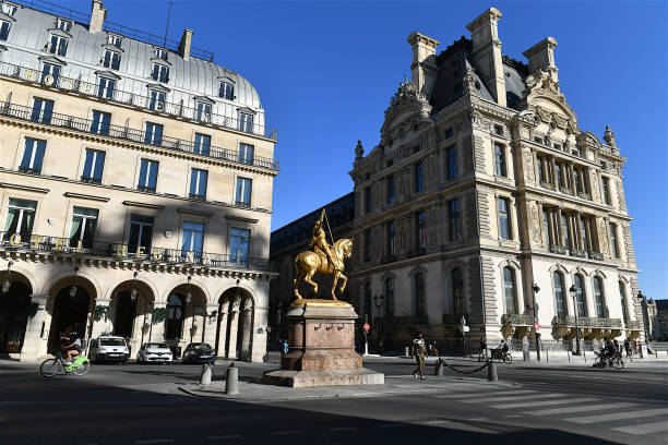 Parisian scenery, Paris, France. Paris, France-07 30 2020:The golden equestrian statue of the French heroine Joan of Arc (1412 - 1431), which is prominently located in the Place des Pyramides near the Louvre in Paris. place des pyramides stock pictures, royalty-free photos & images