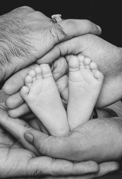 istock Newborn Baby Legs 1262981874