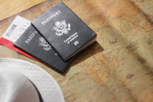 istock Passport placed on the world map, travel concept 1262987818