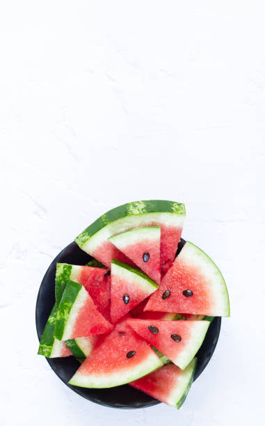 istock Slices of ripe watermelon top view with copy space 1262990979