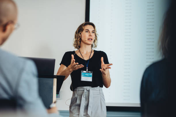 istock Business professional giving a speech in a conference 1262992469