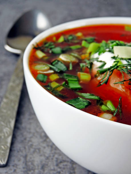 istock Tomato soup - borscht with sour cream and herbs. 1262993586