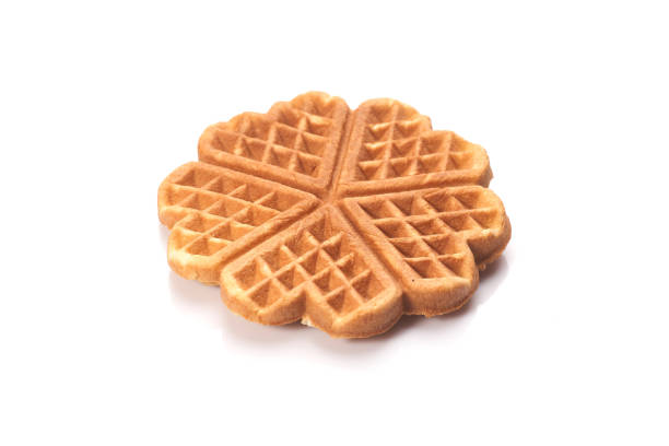 istock Freshly baked waffles isolated on white background 1262995851