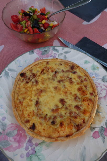 istock Quiche Lorraine cooked in the oven and a mixed salad  Buffet meal 1262997578