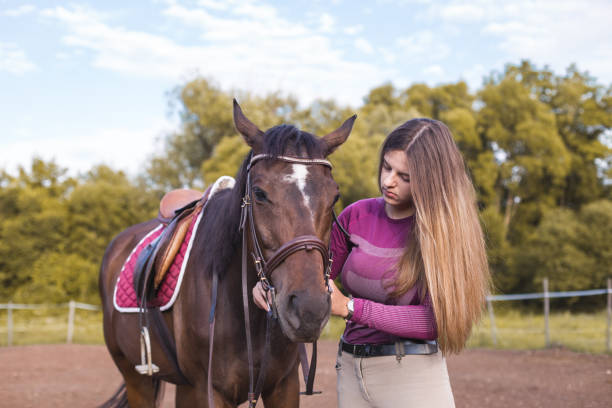 istock Young girl and her horse 1262998662