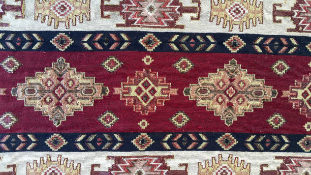istock Fabric with Armenian pattern. Carpet detail with traditional ornaments and patterns. Embroidery is one of the oldest types of needlework. 1262999591