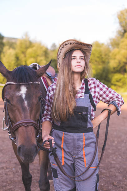 istock Young girl and her horse 1262999757