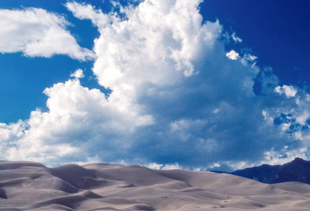 istock Great Sand Dunes NM - Undulating Dunes & Clouds - 1990 1262999924