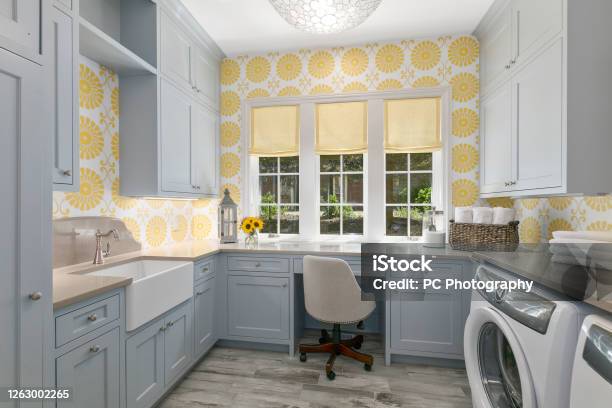 Farmhouse Sink And Desk Add Efficient Options To This Utility Room Stock Photo - Download Image Now