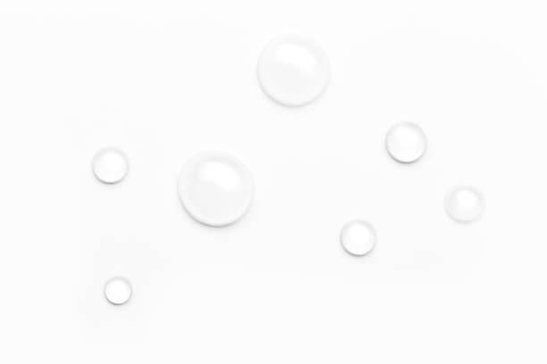 istock drops of water on a white background, top view. minimalism. purity 1263009560