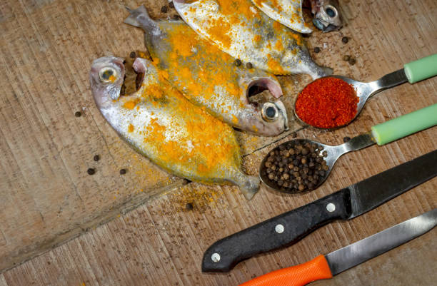 istock Fresh cleaned Japanese butterfish on wooden background. 1263016035