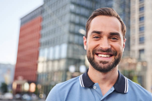 istock Jolly young man spending day in city centre 1263016993