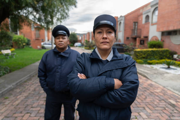 istock Team of strong of security guards working at a gated community 1263019946