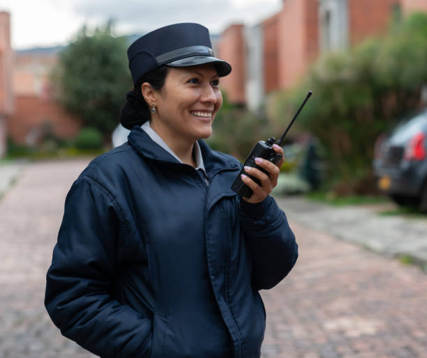 istock Security guard talking on the radio 1263020506