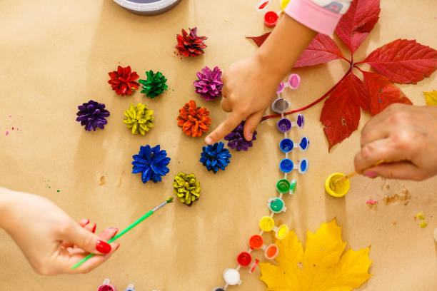 istock paint for coloring leaves and cones. Autumn background about creativity, return to school. Save the space back to school 1263021590