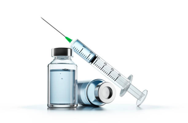 Close-up of medical syringe with vaccine Covid-19, Coronavirus vaccine in vial with syringe on white background. vial stock pictures, royalty-free photos & images