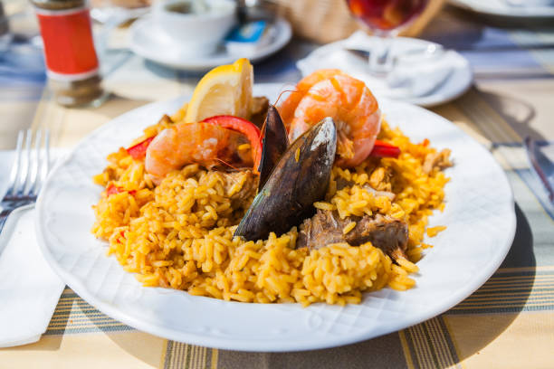 istock paella with seafood and meat 1263021976