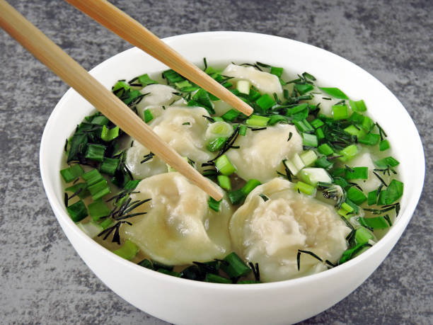istock Broth with dumplings and greens. 1263023260