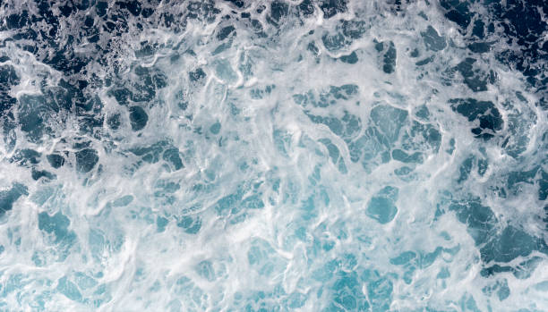 istock Sea foam moving in the ocean 1263024353