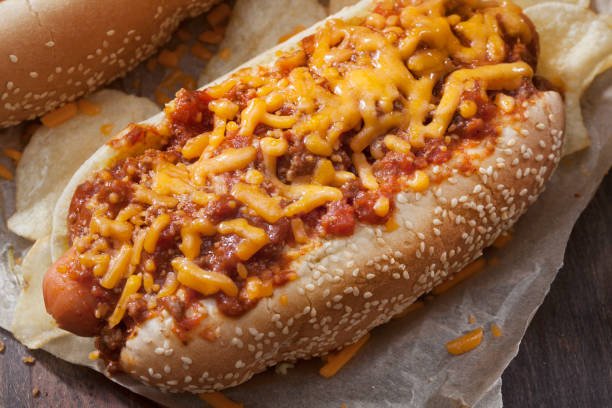 istock Chili and Cheese Hotdog with Potato Chips 1263029291