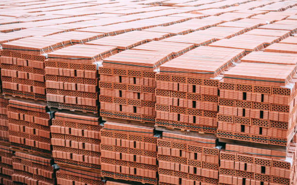 istock Stacks of orange brick on pallet. Brick production concept 1263032978